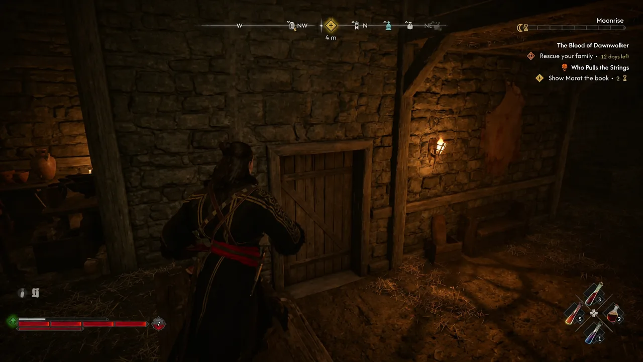 Quest tracker listing Rescue your family and the objective to show the book while approaching a wooden door