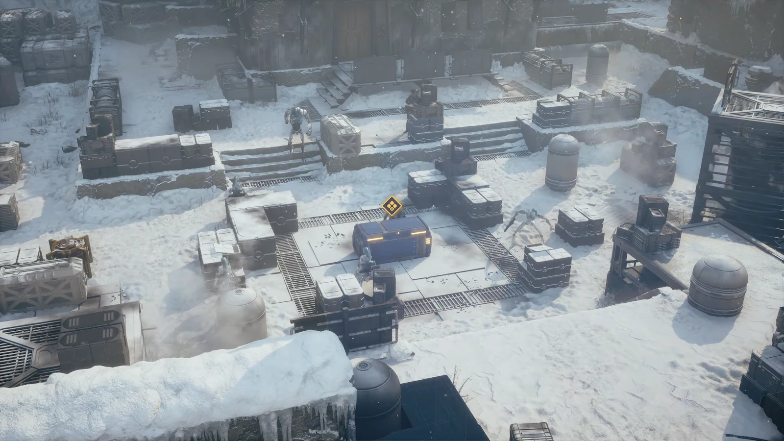 Snowy facility interior with a blue supply crate marked by a yellow objective icon