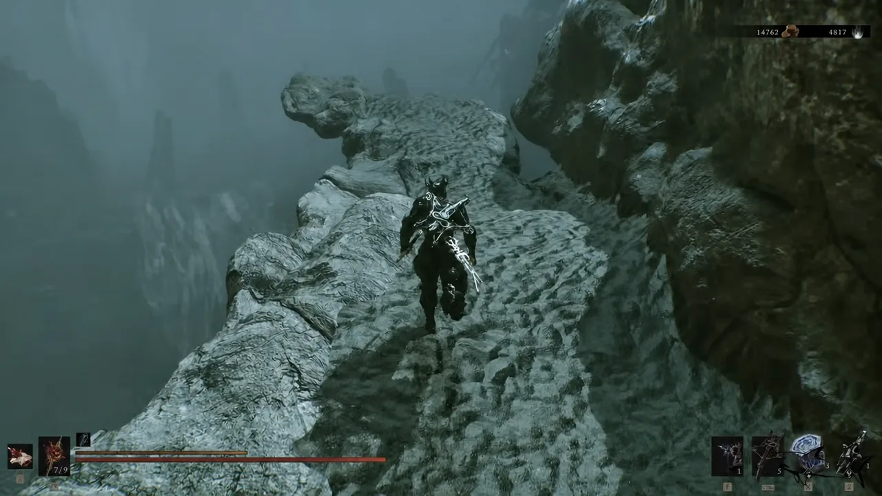 Character walking along a narrow rocky ledge on the cliff route toward Nameless Pass