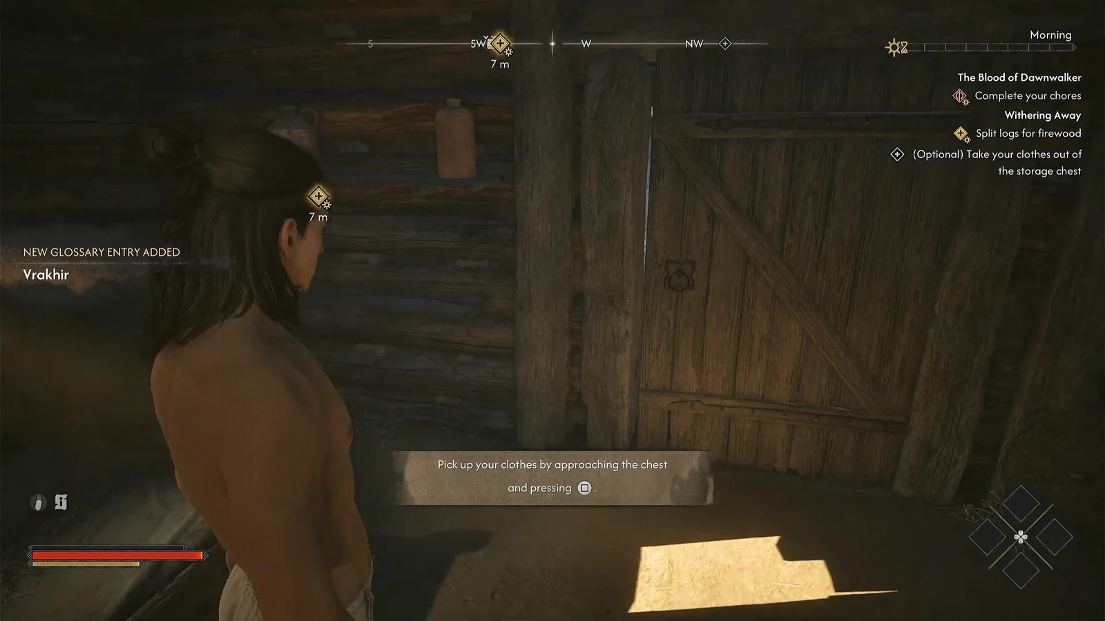 On-screen prompt to pick up clothes from the storage chest by pressing Square