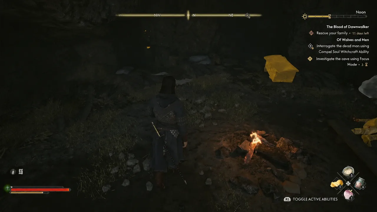 Focus Mode highlighting an object inside the cave in gold during the quest