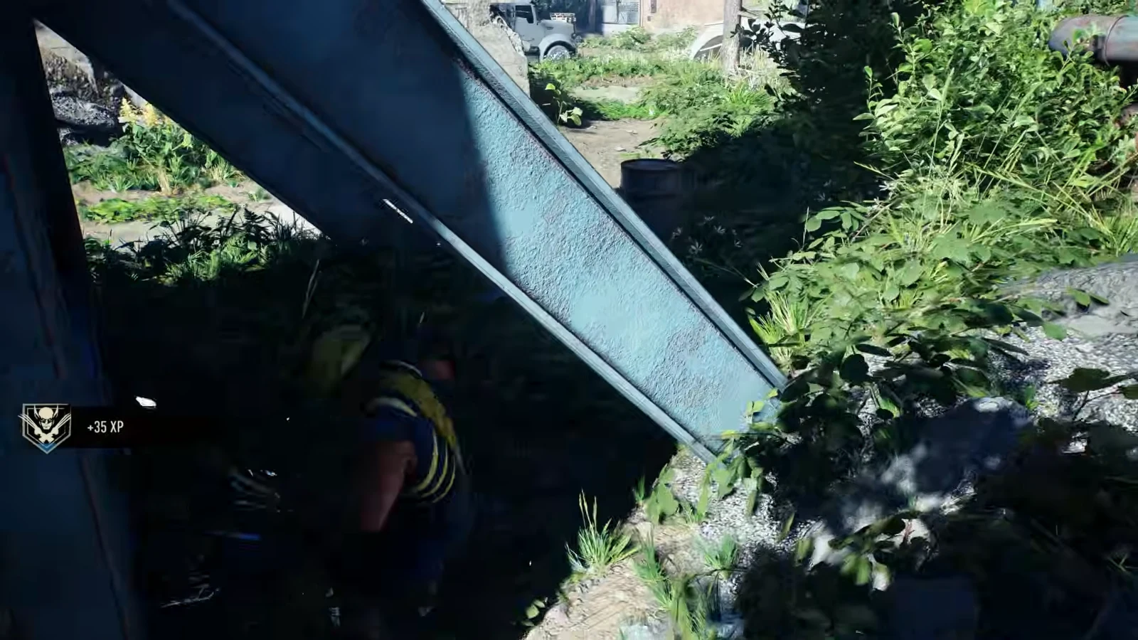 Wolverine crouched under a tilted metal panel in an overgrown ruin with a plus 35 XP popup on screen