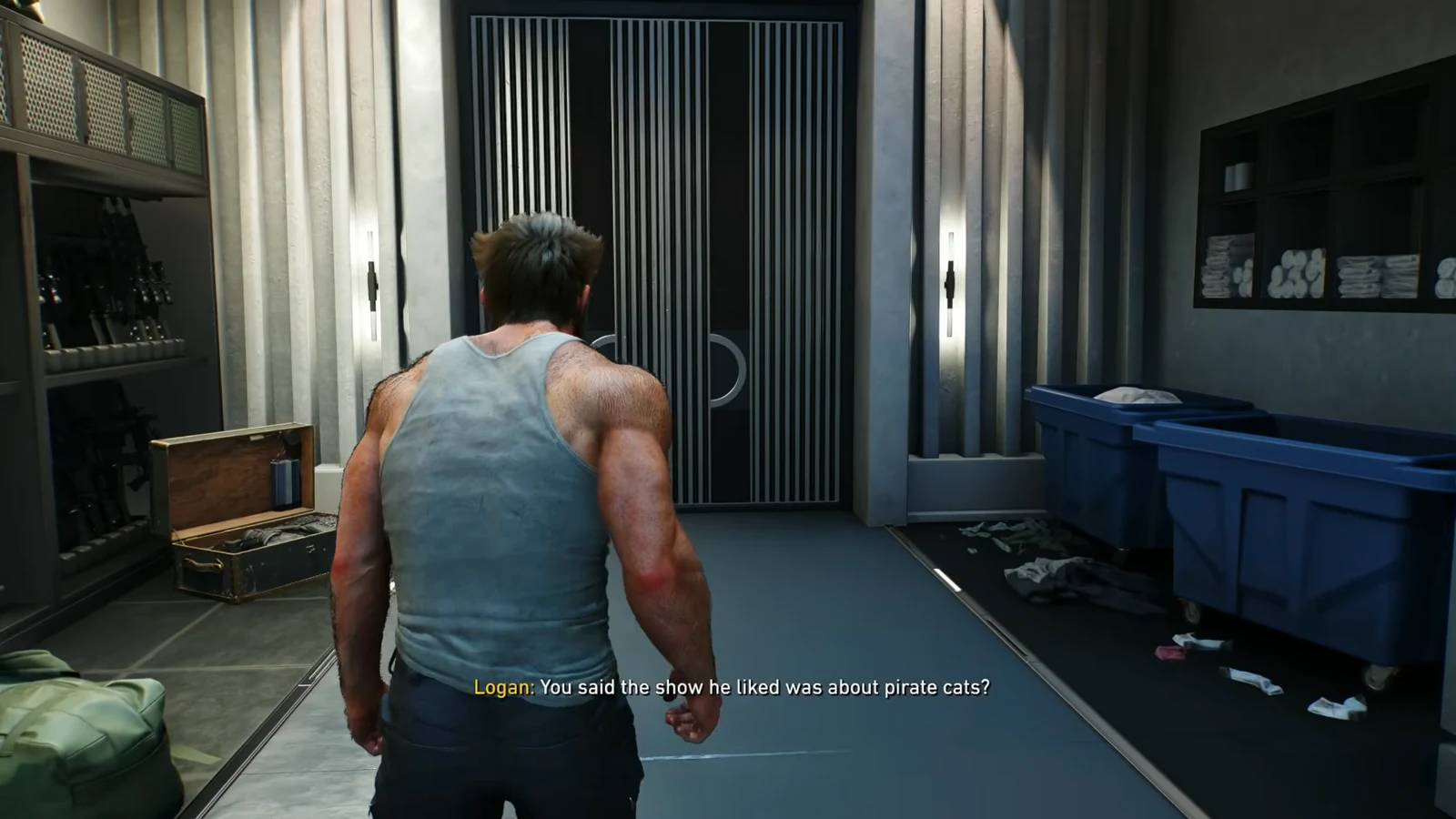 Logan approaches Leech's barred door while subtitles show him asking about a pirate-cat show