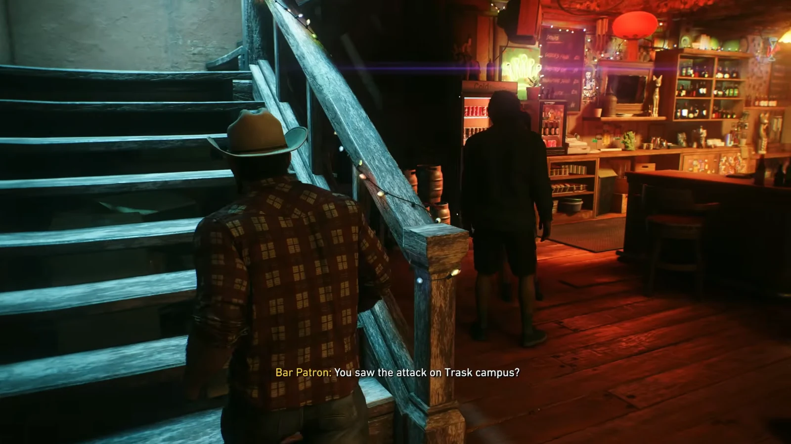 Logan walks toward the warmly lit counter of the Princess Bar in Lowtown as patrons talk nearby