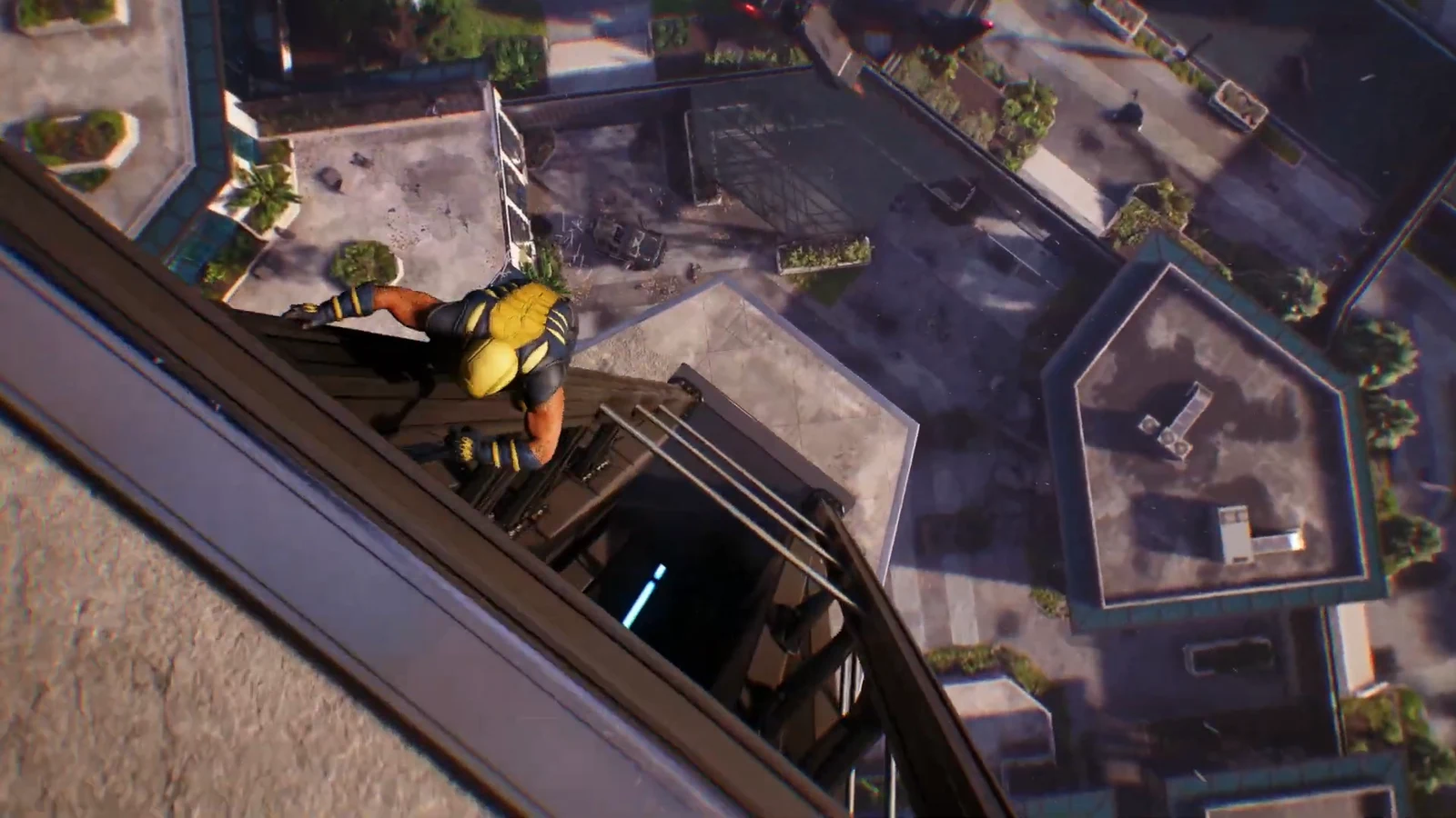 Wolverine in yellow gear scaling the outside of a tall tower above the city