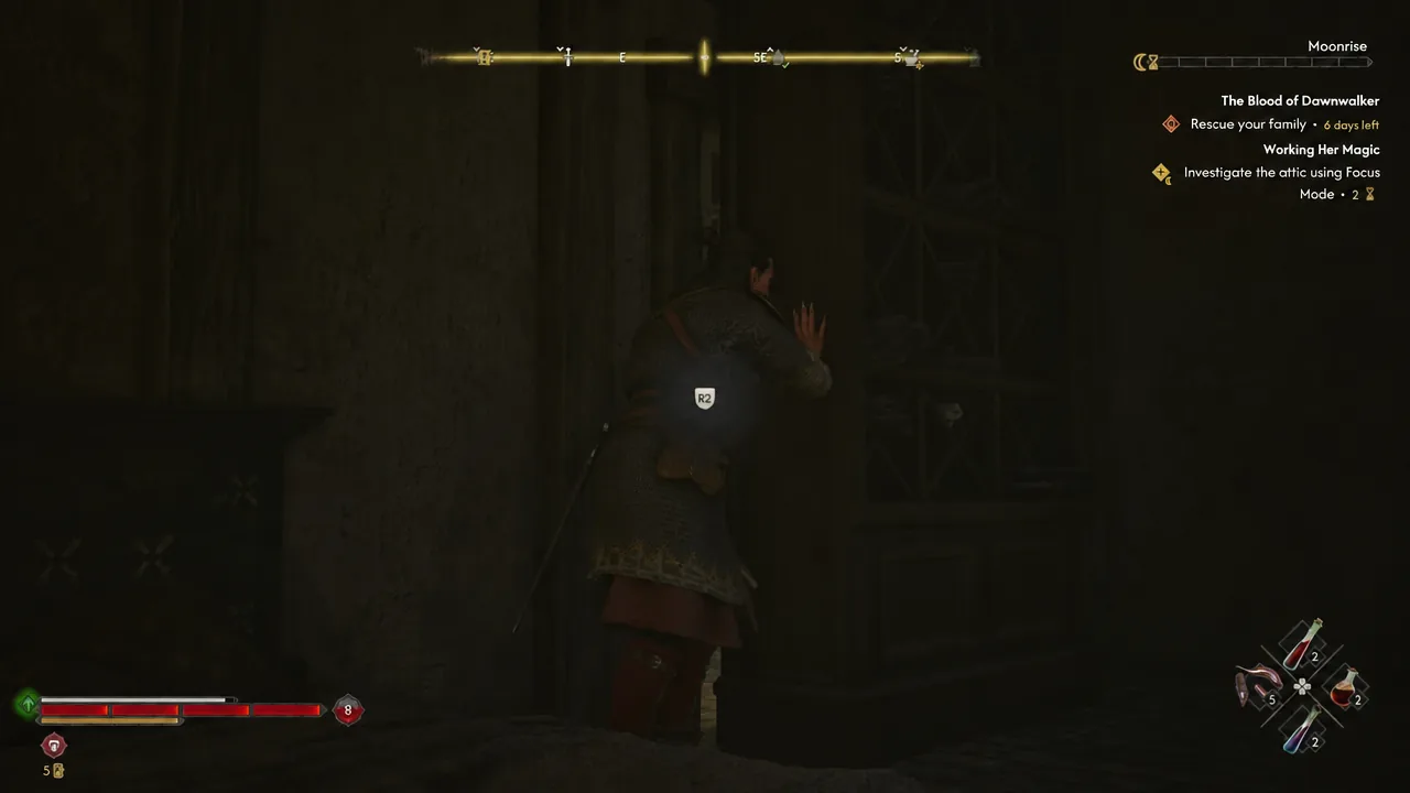 On-screen prompt to hold R2 to push the attic door open