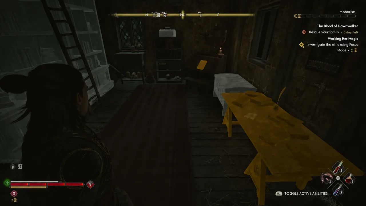 Focus Mode outlines the worktable inside the hidden room as an object that can be investigated