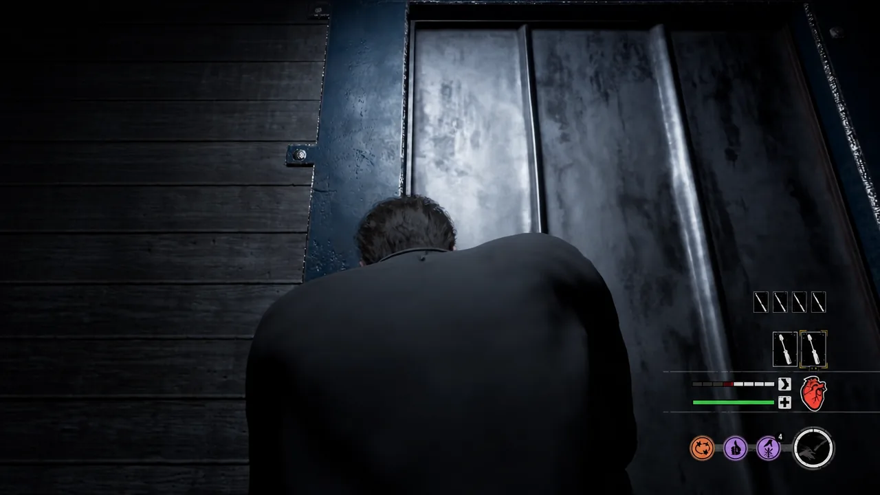 Crouching beside a metal door with the item slot highlighted on the gameplay HUD