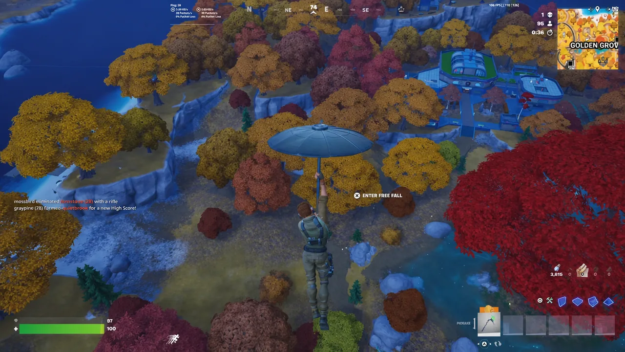 Player glides over Golden Grove with the X Enter Free Fall prompt highlighted on screen