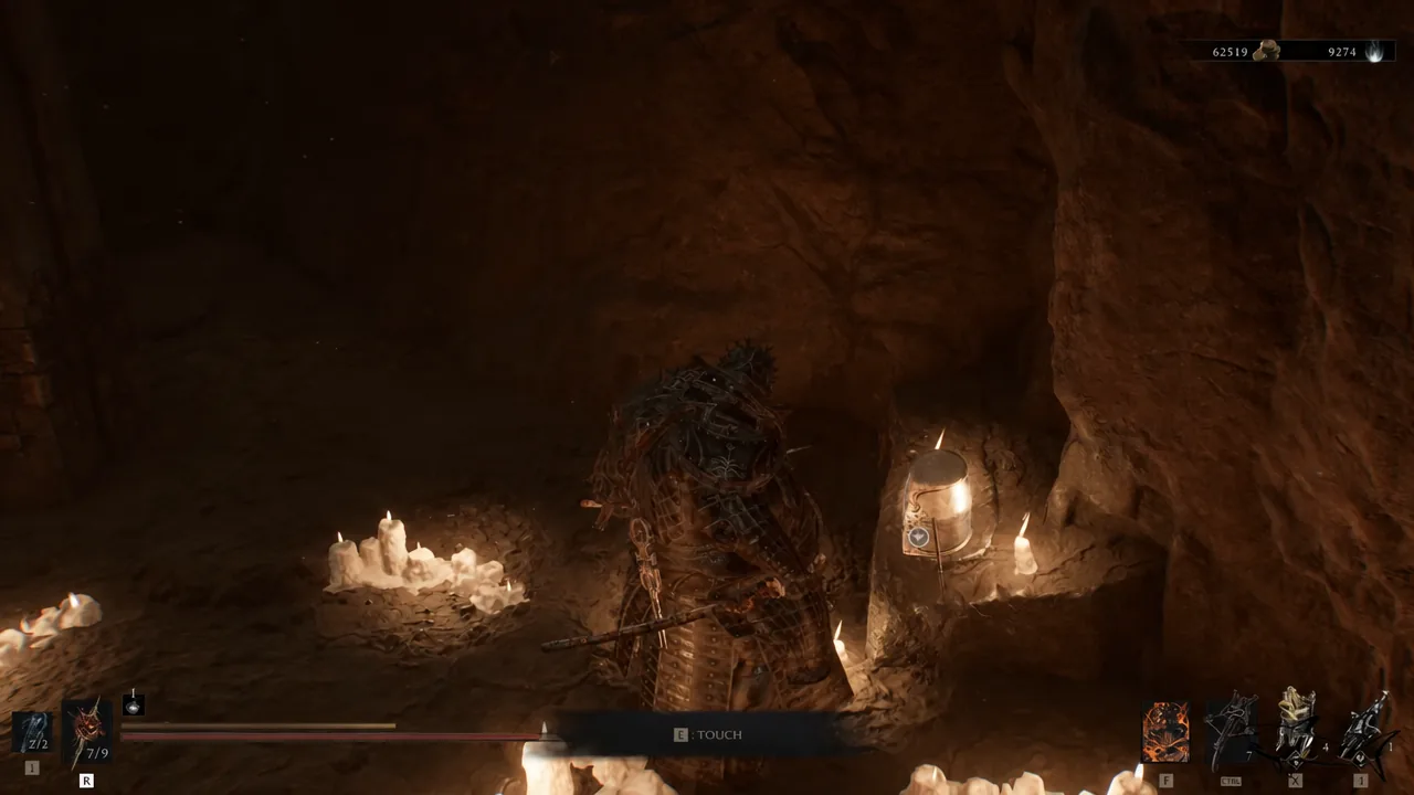 The interact prompt at the helmet pedestal in the back room of the Besieged Ruins.