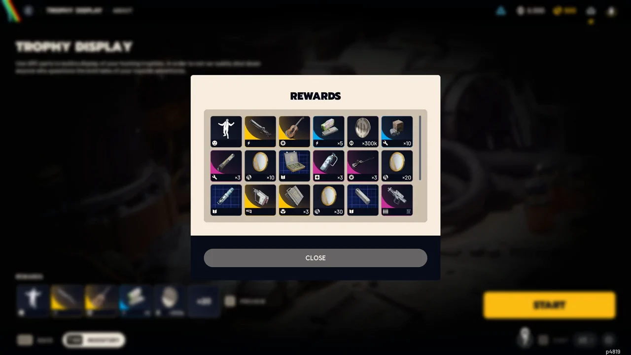 REWARDS pop-up on the Trophy Display screen listing prize items with a Close button