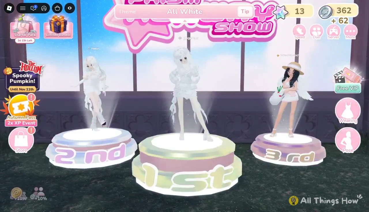 Three contestants in white outfits standing on the first, second, and third place podiums