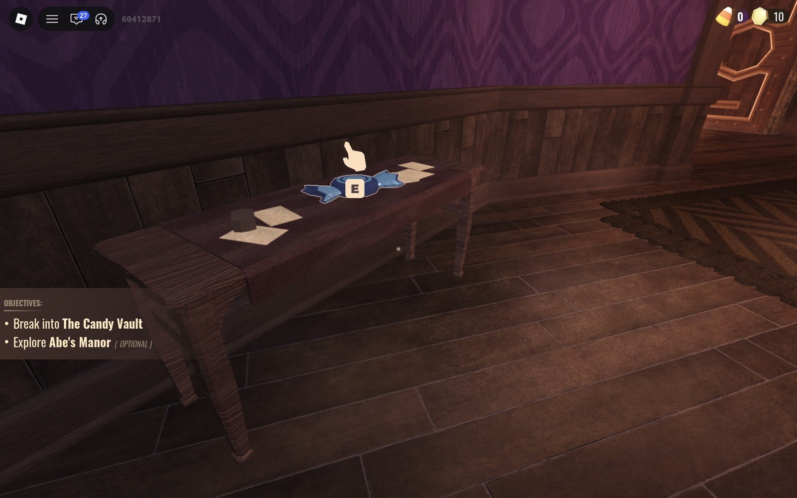 Light-blue wrapped candy with an E prompt on a hall table by the upstairs bedroom door in DOORS