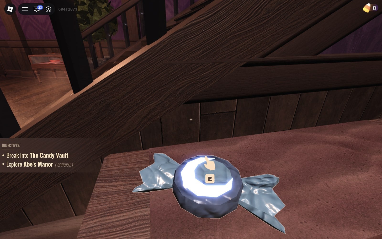 Blue wrapped candy with a crescent moon on a foyer bench in DOORS The Candy Vault, with the hand icon and E prompt