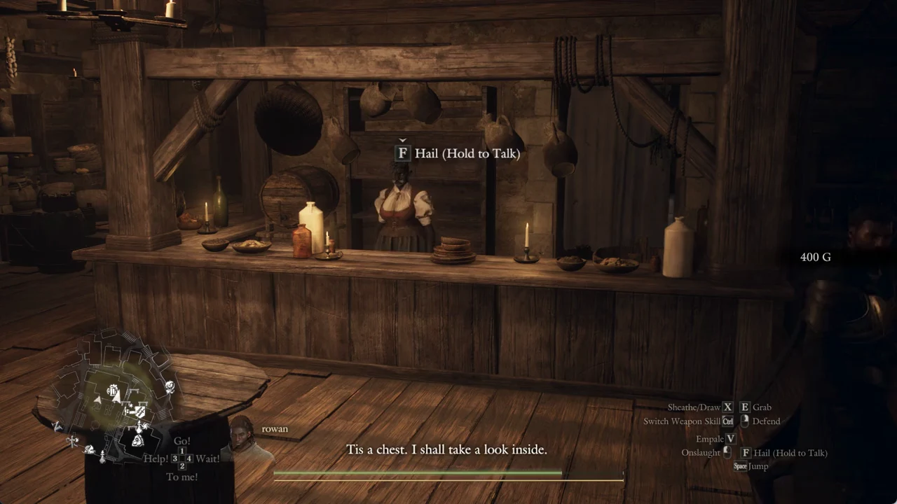 Brant at the counter with the hold-to-talk prompt before he moves to the back table