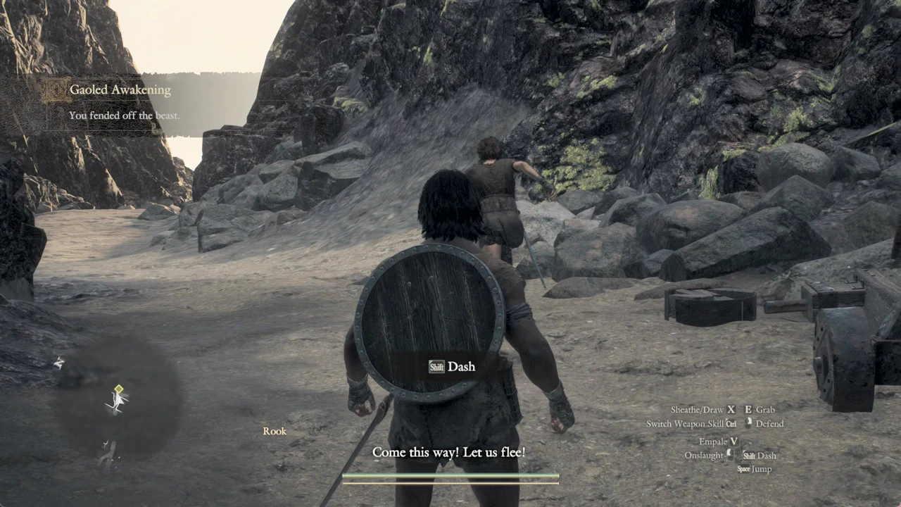 Following Rook through the rocky canyon passage with the Shift Dash prompt after the fight