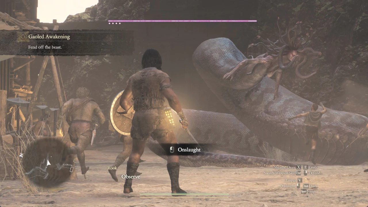 The player attacking the snake-bodied gorgon with the Onslaught prompt during the Fend off the beast task