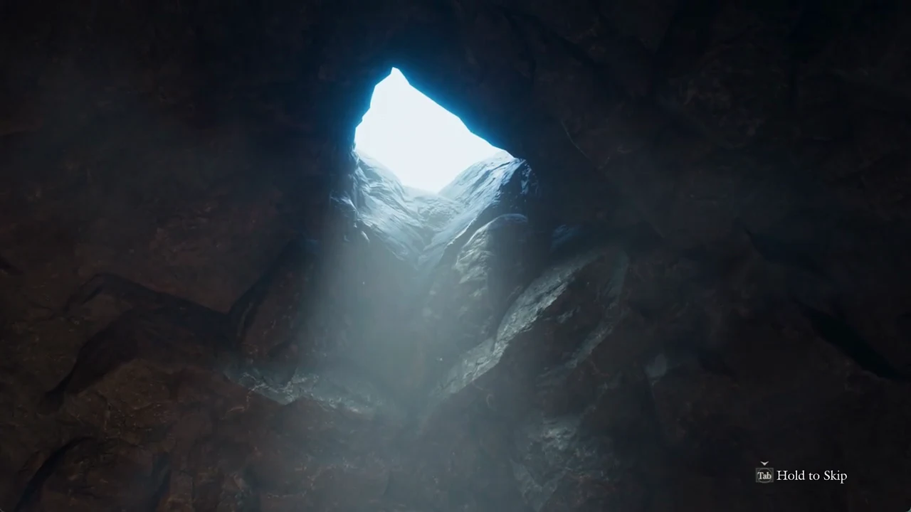 A cave cutscene playing with the Tab Hold to Skip prompt in the lower-right corner