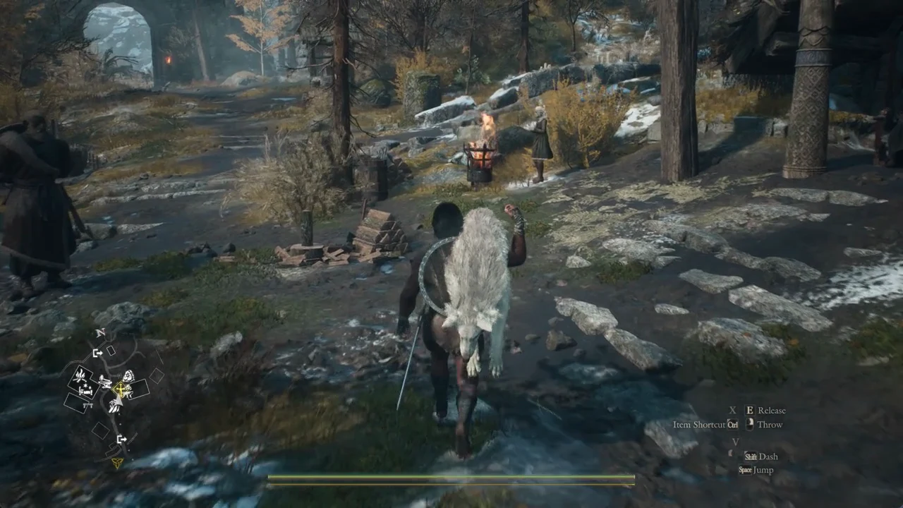 Character carrying the pup over one shoulder up to an NPC by a fire