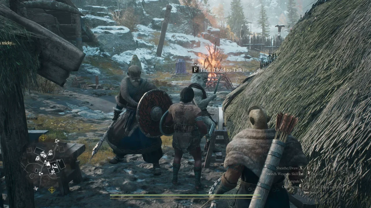 An NPC in an encampment with the floating F Hail Hold to Talk interaction prompt