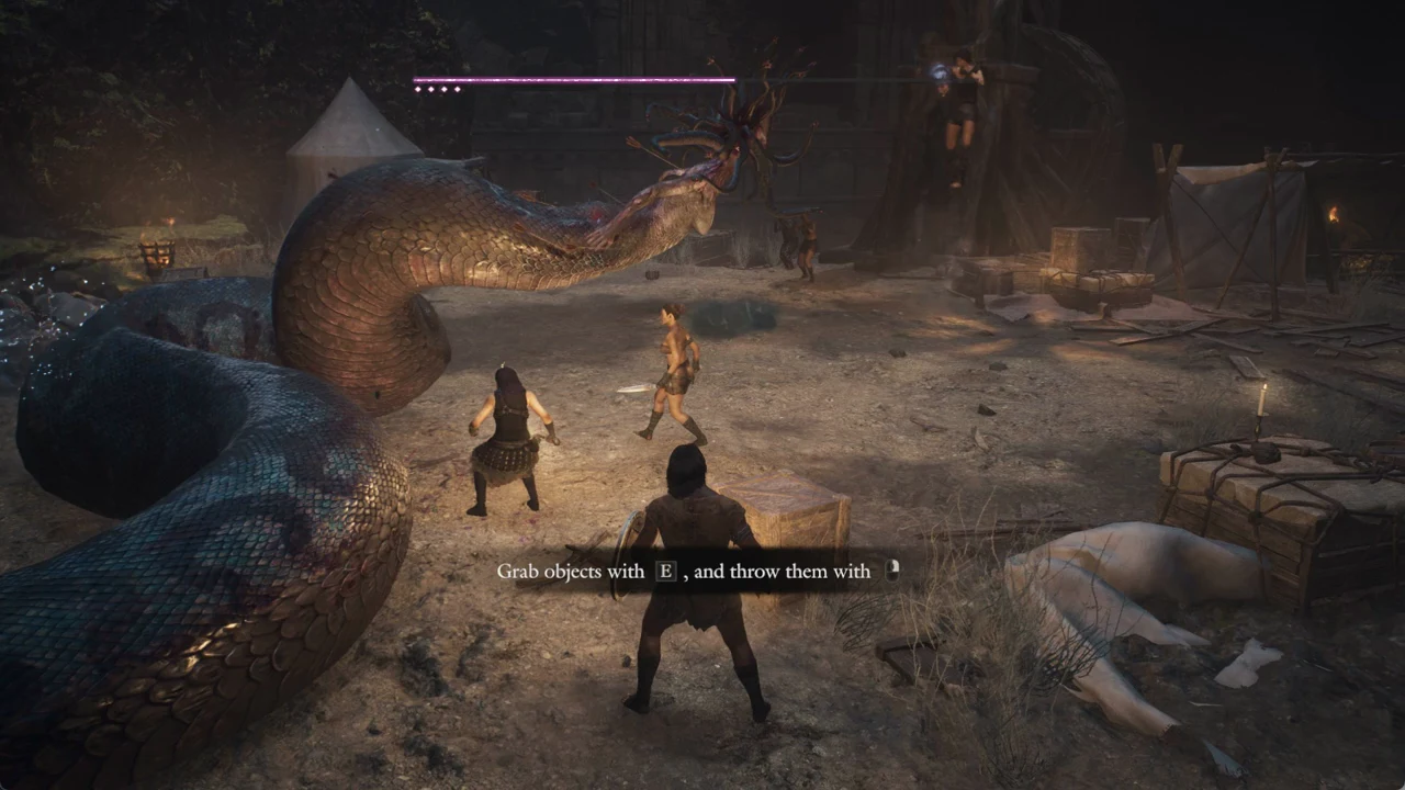 Combat against a serpentine foe with on-screen prompts to grab objects with E and throw with the mouse