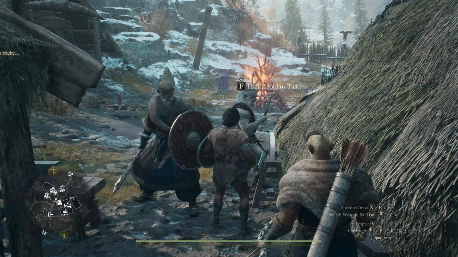Third-person view of a character and two pawns in a snowy village near a bonfire, with a Hail prompt and minimap.