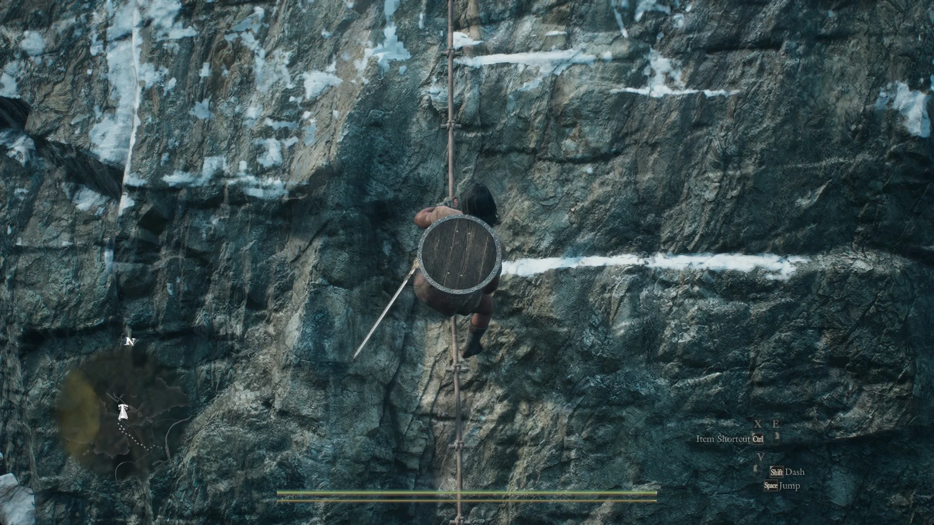 The Arisen climbing the rope ladder up the grey cliff face above Lake Norgan