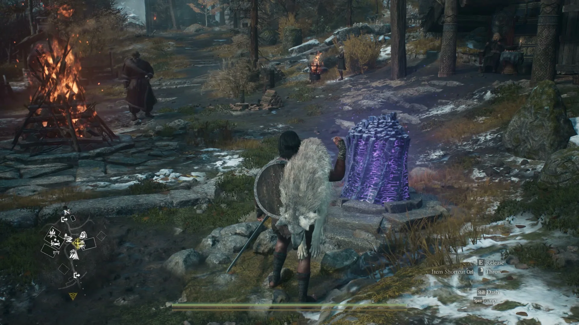 The Arisen carries Skoll past the portcrystal inside the Norgandian Settlement, the bonfire and Dorin to the left and Ilsa's fire basket ahead