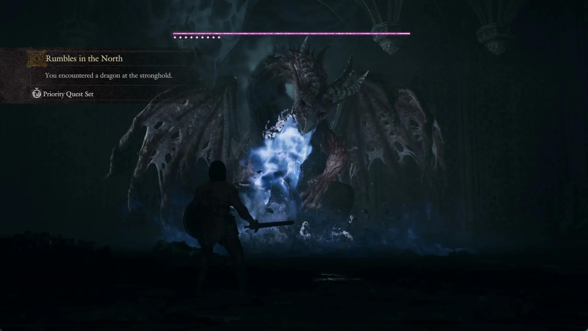 Quest banner reading You encountered a dragon at the stronghold, with a long purple health bar and nine dots at the top of the screen as the dragon breathes blue fire