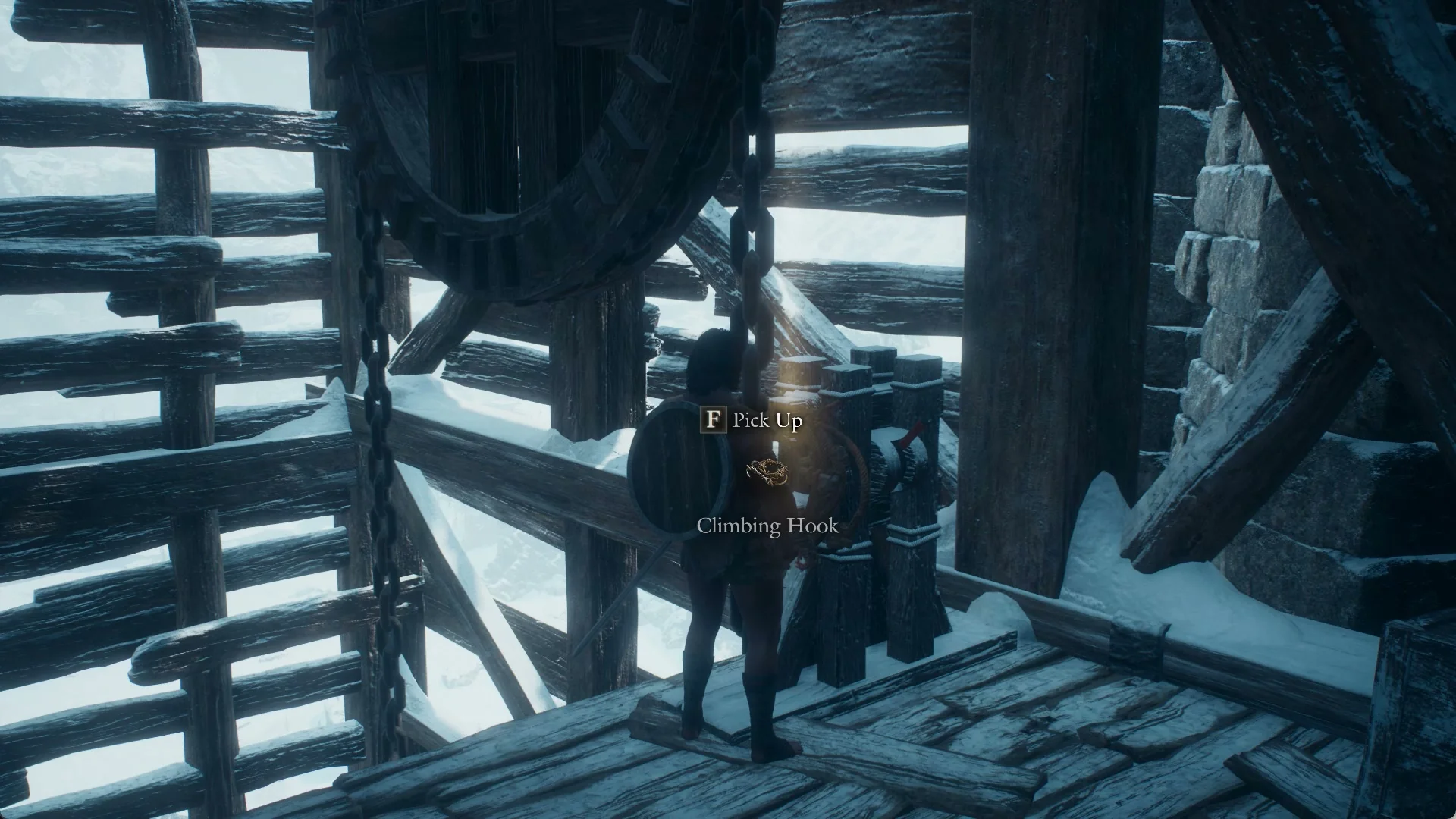 Pick Up prompt for a Climbing Hook on the wooden winch frame inside the Mountain Stronghold winch house