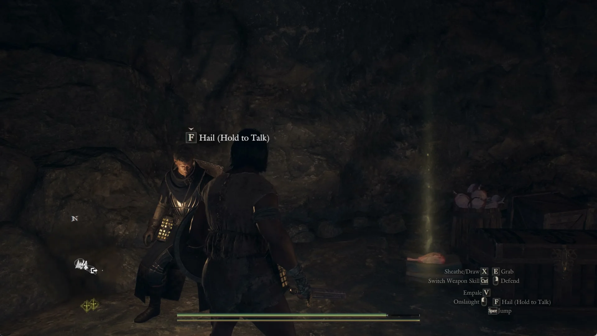 Hail (Hold to Talk) prompt on Amos at the back of the Northwall Campground cave, crates behind him