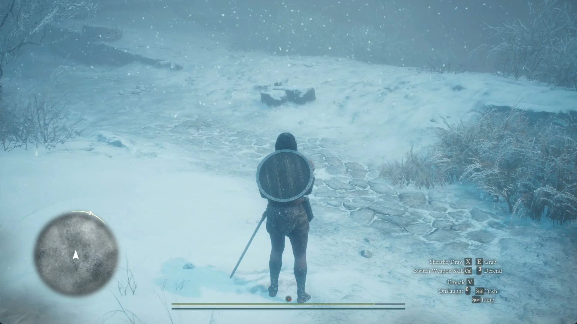 The Arisen walks a snow-covered stone path in a whiteout, the minimap a blank grey disc