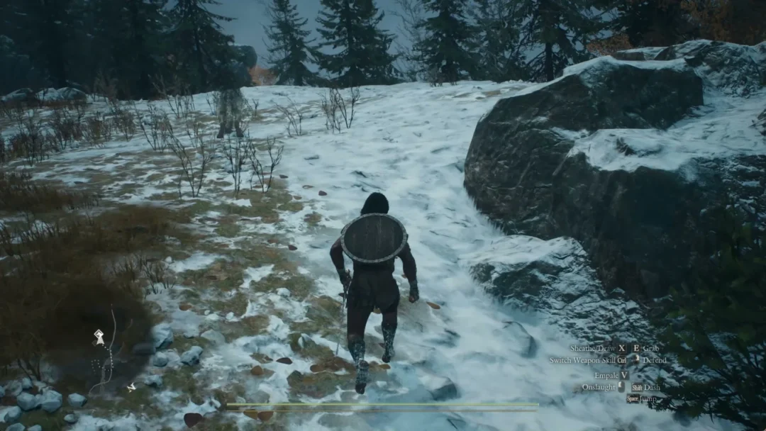 The hound Freki trots ahead over a snow slope with the Arisen following
