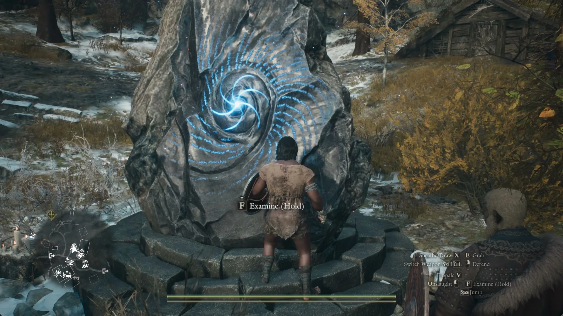 The Arisen standing on the stone steps in front of the Grand Riftstone of Norgan, its spiral carving glowing blue, with the Examine (Hold) prompt on screen