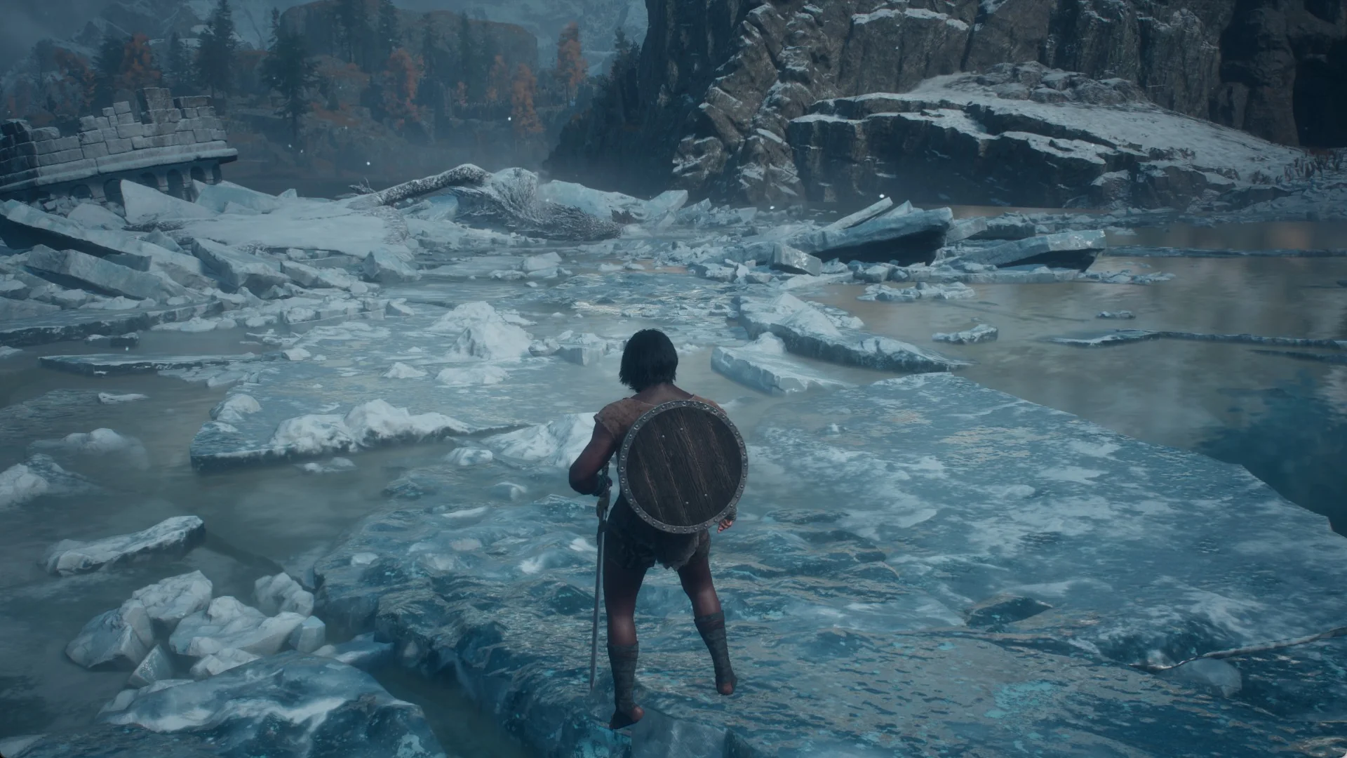 The Arisen walking on the frozen surface of Lake Norgan among floes toward the stone ruin