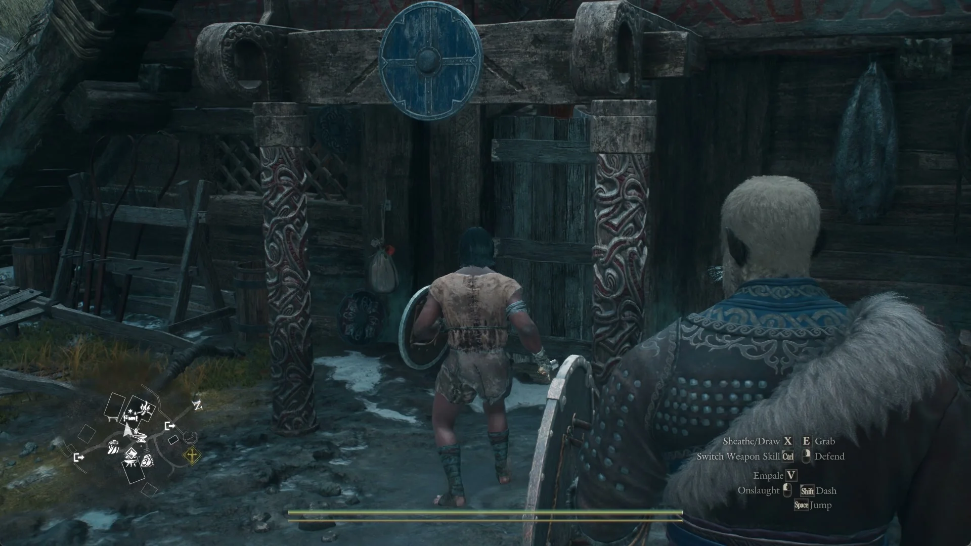 Outside the Norgandian Inn, its carved door frame topped by a round blue shield