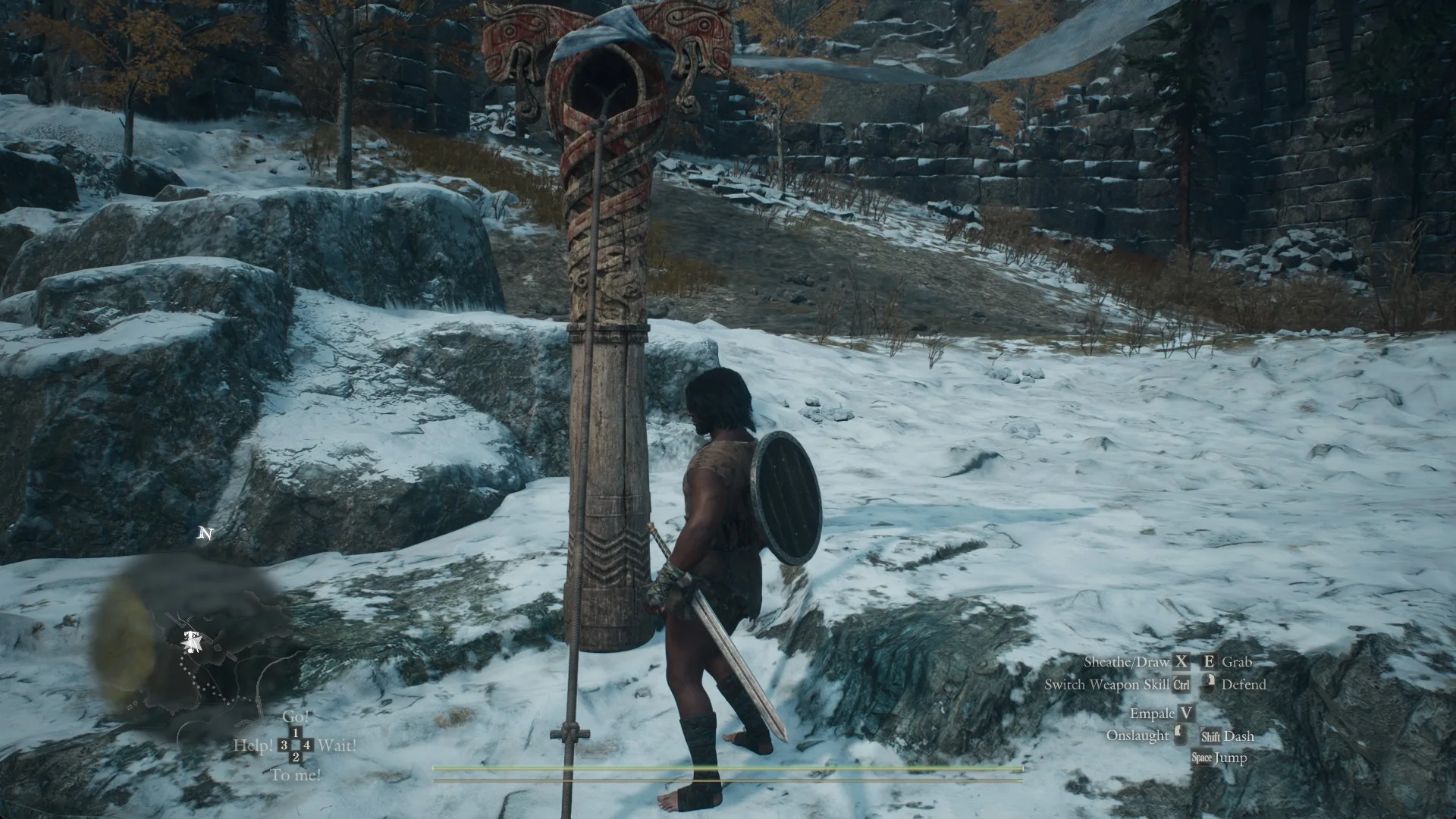 The Arisen standing beside the carved red tether post on the snowy cliff top with ruined stone walls behind