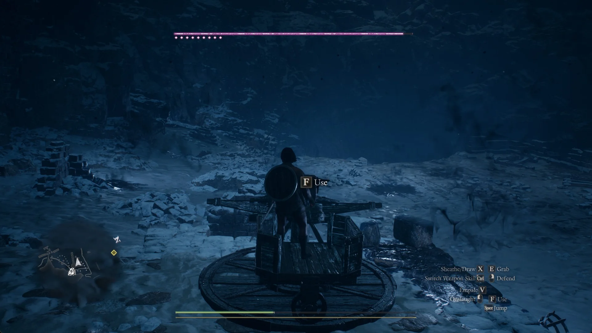 The Use prompt beside the Arisen standing on a ballista's wooden turntable among snow-covered ruins