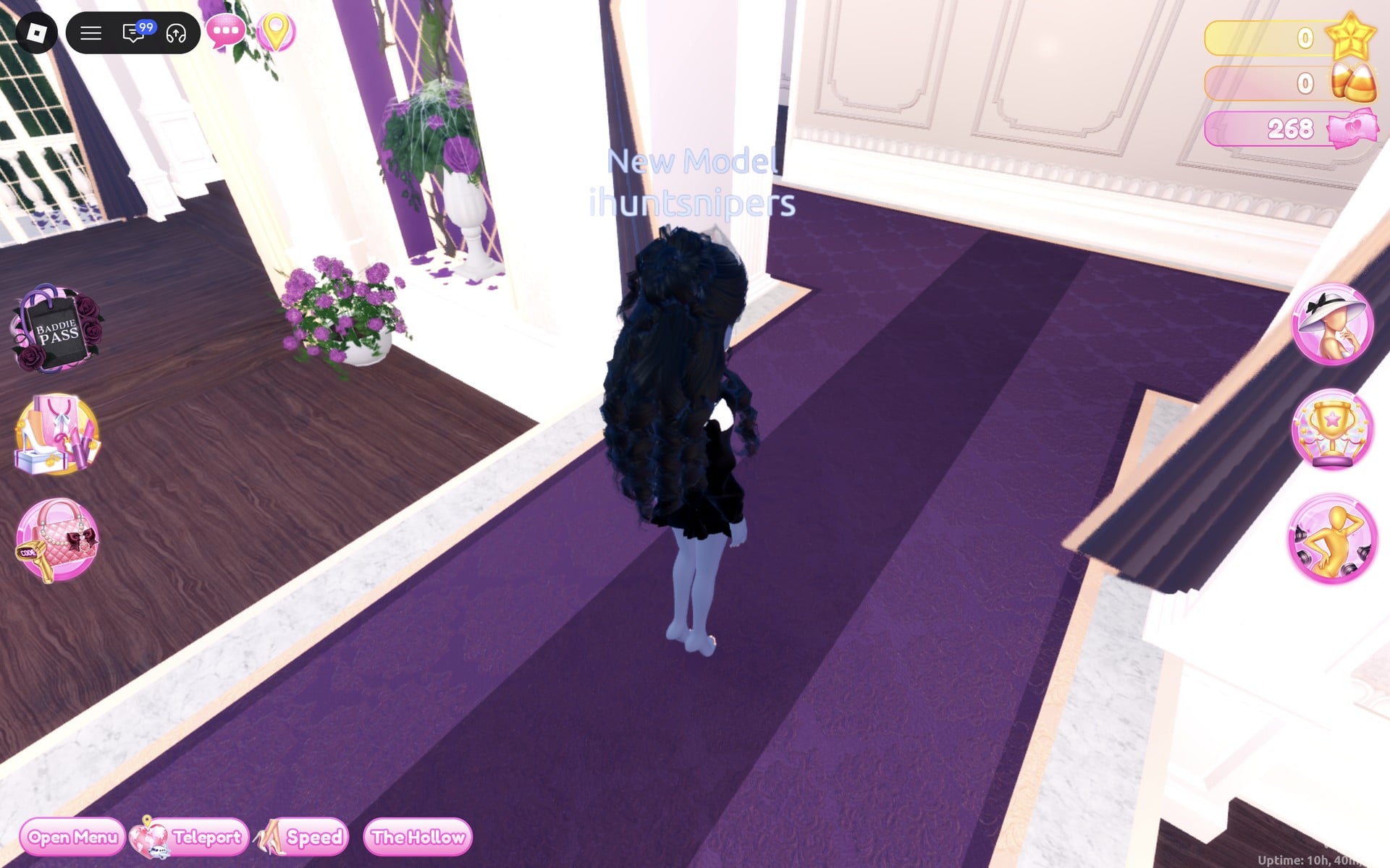 Tux-style look from behind on the Freeplay Runway, long black curls over the black jacket and the black skirt below