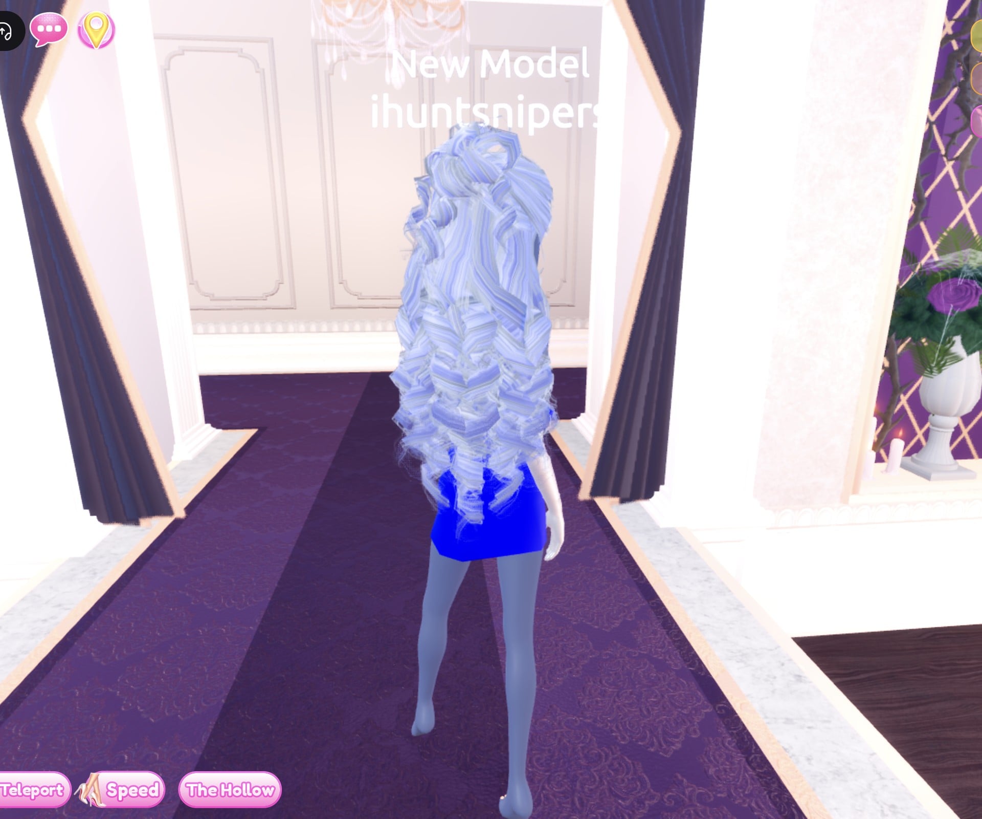 Sapphire look from the back, icy curls over the blue strapless mini