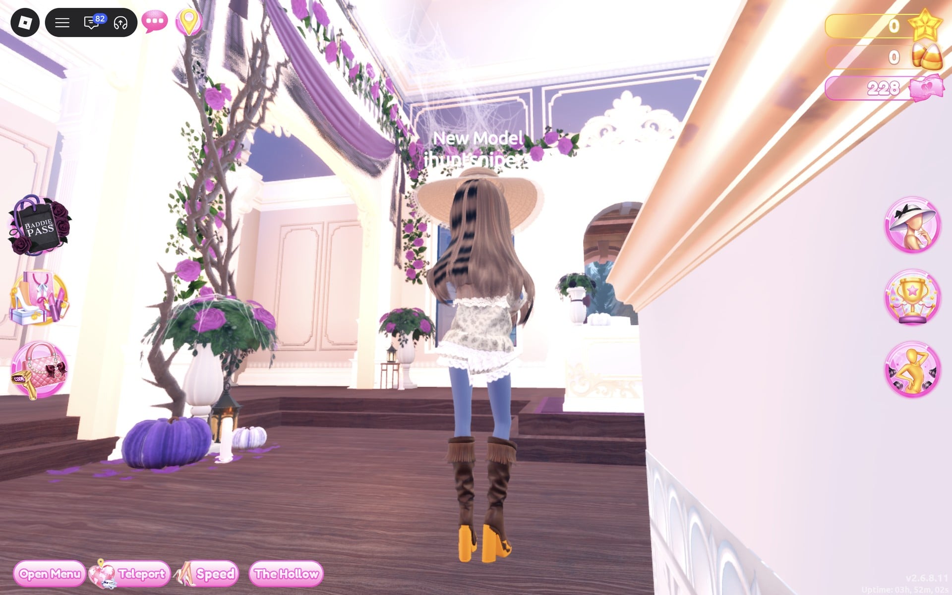 Back view of the prairie boho look: long wavy brown hair under the tan sun hat, lace dress and fringed boots