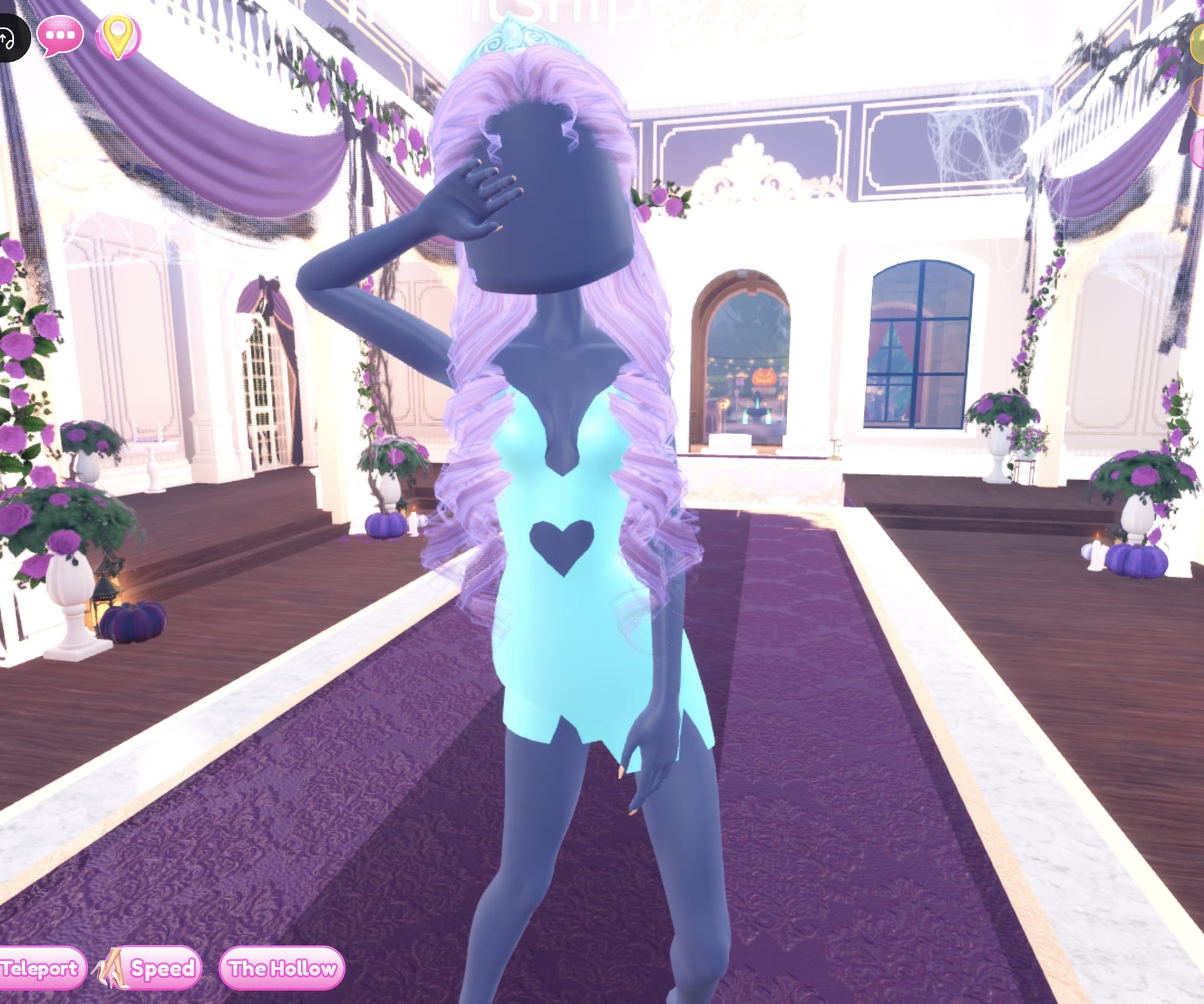 Baby blue Silk mini with a heart cut-out, long lilac curls and a pale blue crown, Sparkle pose with a hand over the face