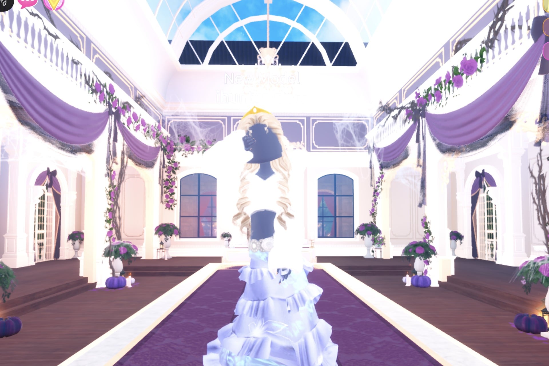 Celestial look from the front with the dark base top showing at the chest between the white fur jacket fronts