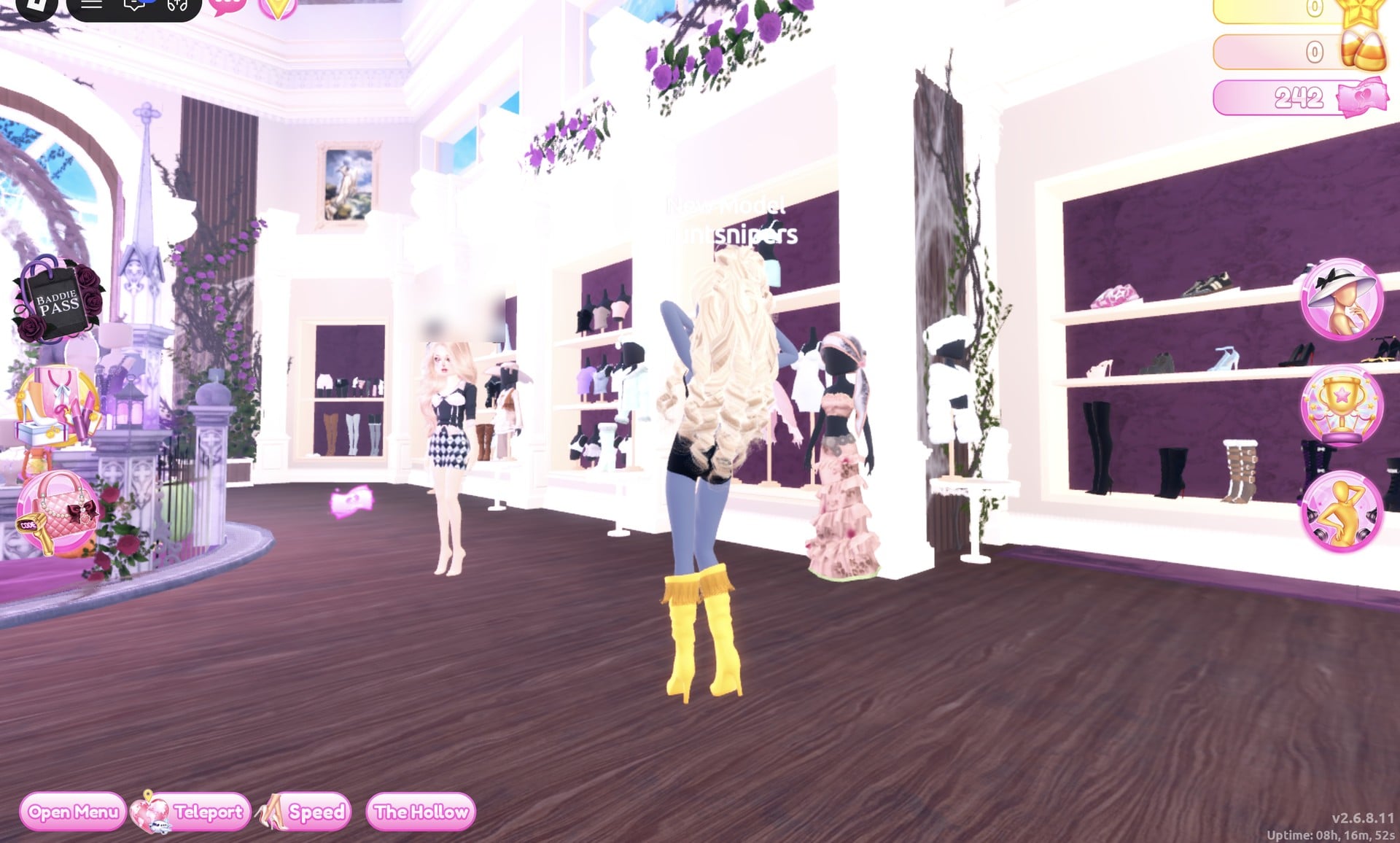 The mannequin in the long pale pink ruffled gown next to the shoe and boot shelf in the Dressing Room