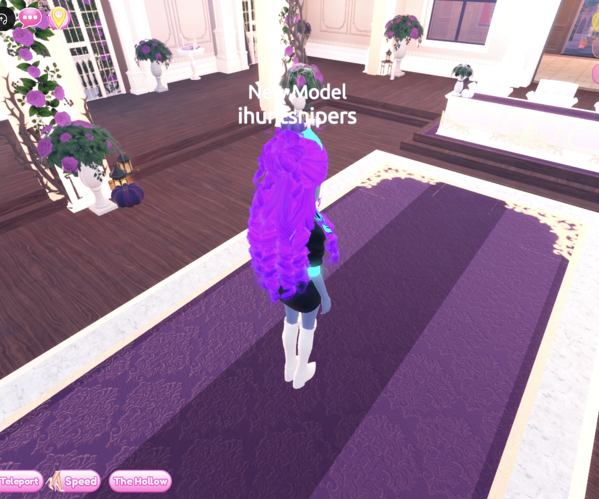 Neon DJ look from behind, long violet curls over the back, black mini and silver boots