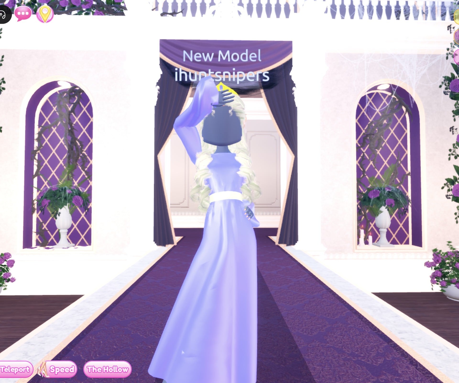 The princess look in the Pearly pose, one arm raised to the head