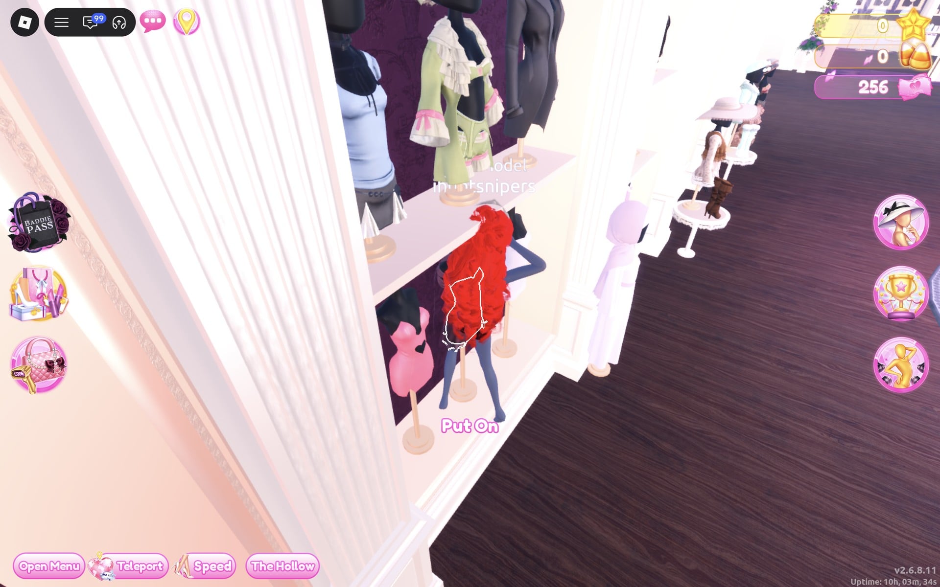 Top of the short-dress shelf with a mannequin in a sage-green coat with cream ruffles and pink bows, a Put On label below