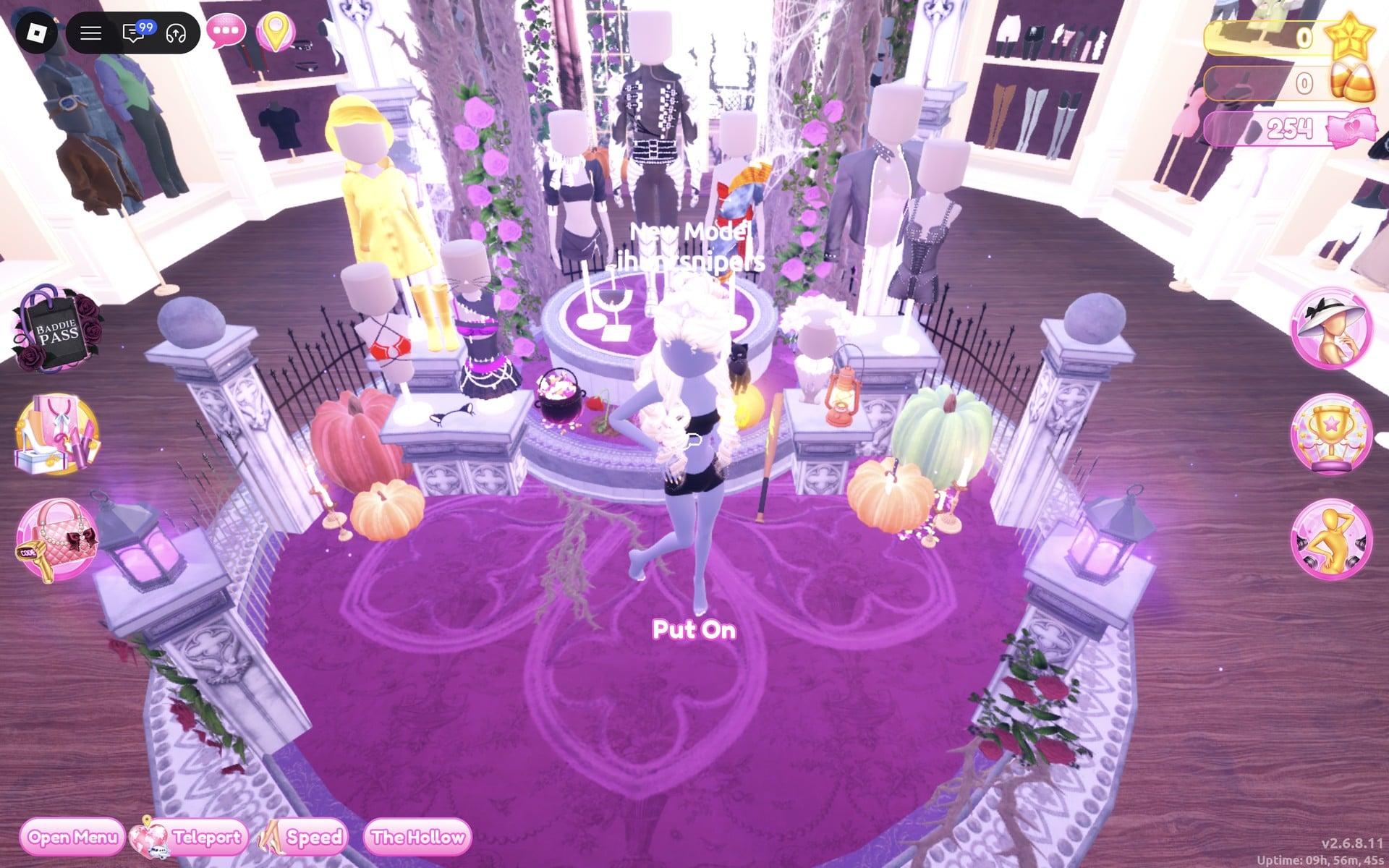 Halloween display circle in the Dressing Room seen from its far side: a mannequin in a yellow raincoat and yellow rain hat on the left with yellow rain boots in front of it, pumpkins around the podium