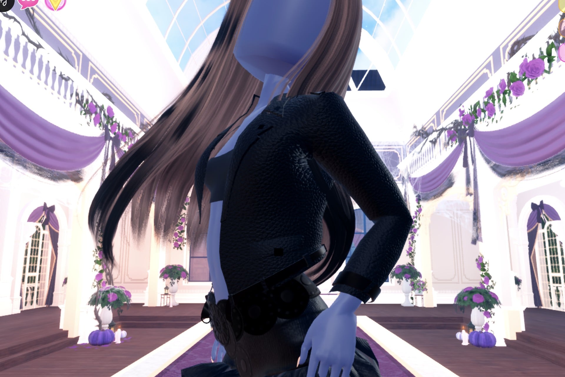 Close-up of the all-black look: cropped black leather jacket over the default black top and the top of the black ruffled skirt