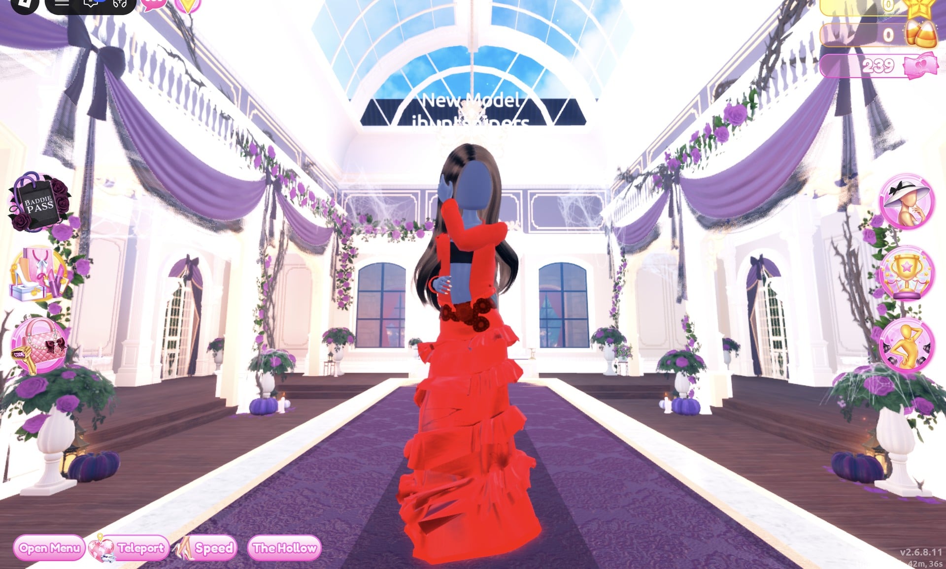 All-red Monochrome Mood look on the runway: red ruffled gown with dark red flower details at the waist and a cropped red jacket